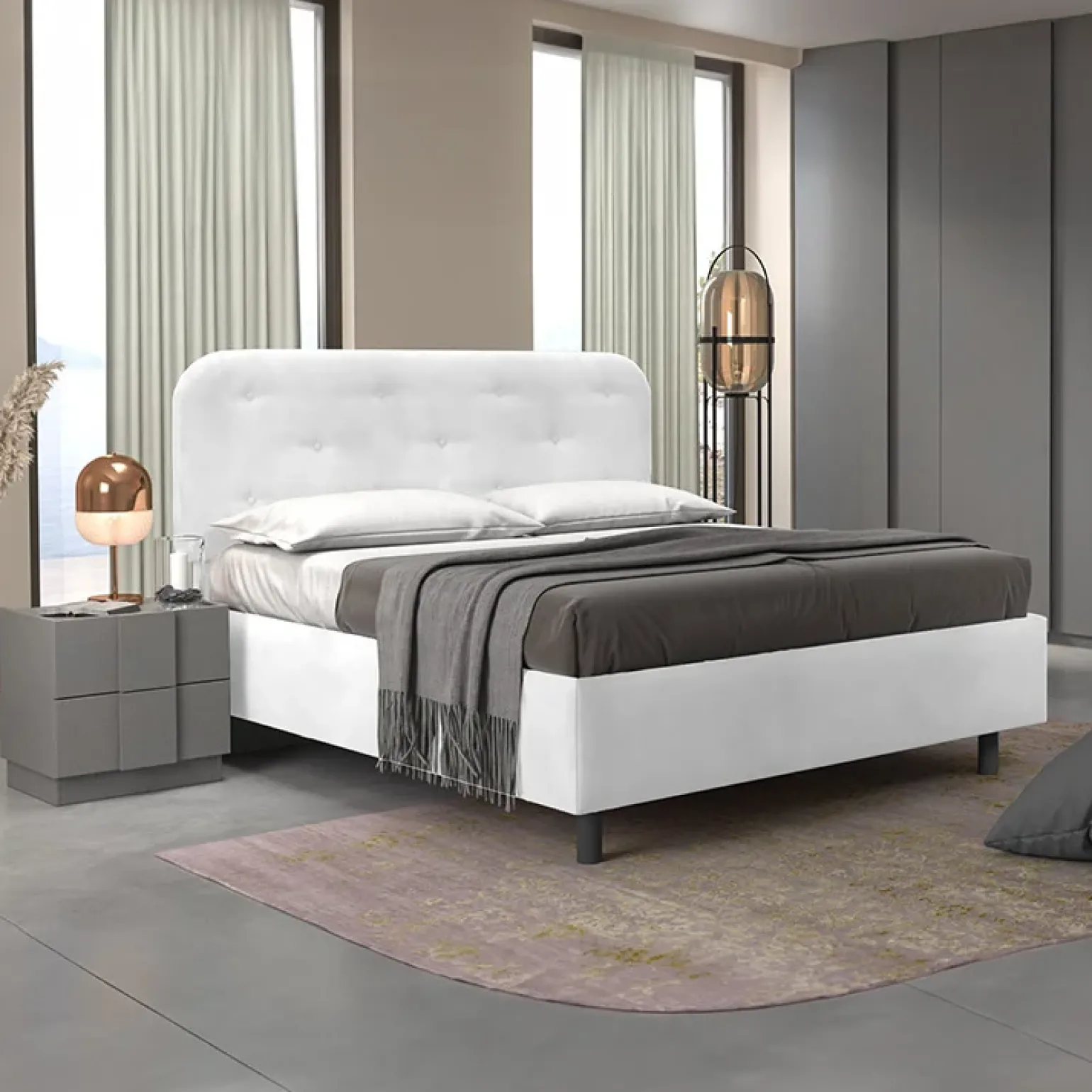 Letto contenitore una piazza e mezza 120x195cm imbottito ecopelle bianco DreamLift