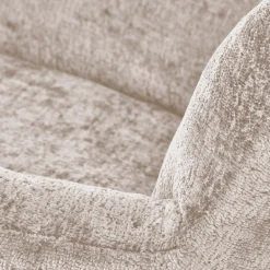 Poltrona a dondolo imbottita in tessuto beige Isla