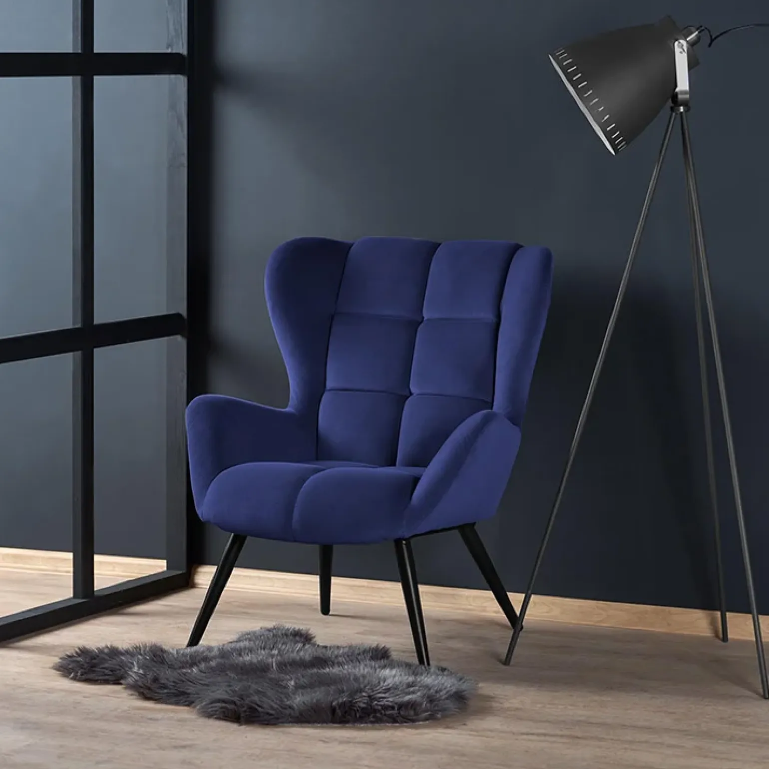 Poltrona imbottita in tessuto velluto blu nero Polly