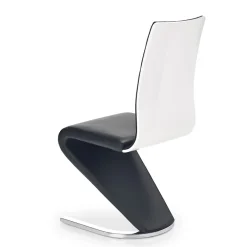 Sedia da pranzo moderna in ecopelle nero bianco gamba in acciaio Elina