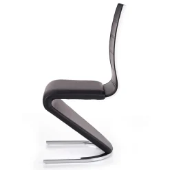 Sedia da pranzo moderna in ecopelle nero bianco gamba in acciaio Elina